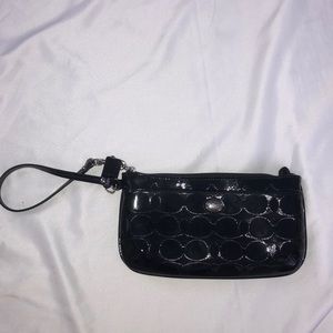 Black leather Coach wristlet